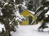 Yellow Cabin in the Woods by Randall Beaudin