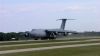 C-5 Landing at Oshkosh by Mark Lester