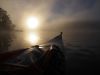 Kayaking at sunrise in the fog